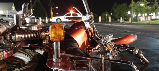 Close up photograph of a crashed motorcycle