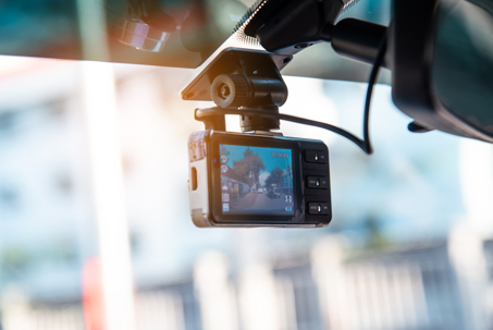 Car video camera attached to the windshield to record driving and prevent danger
