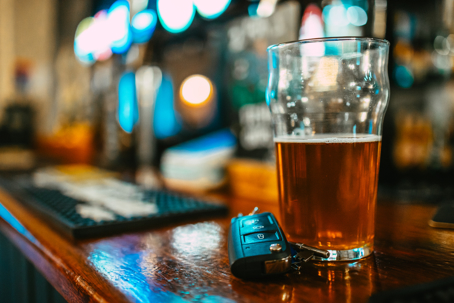 bar with cars and drink on counter
