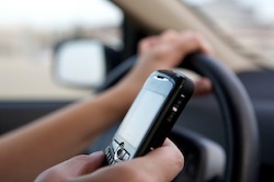 Cellphone on one hand while driving 