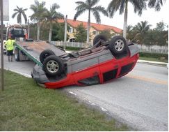 Red car flipped over